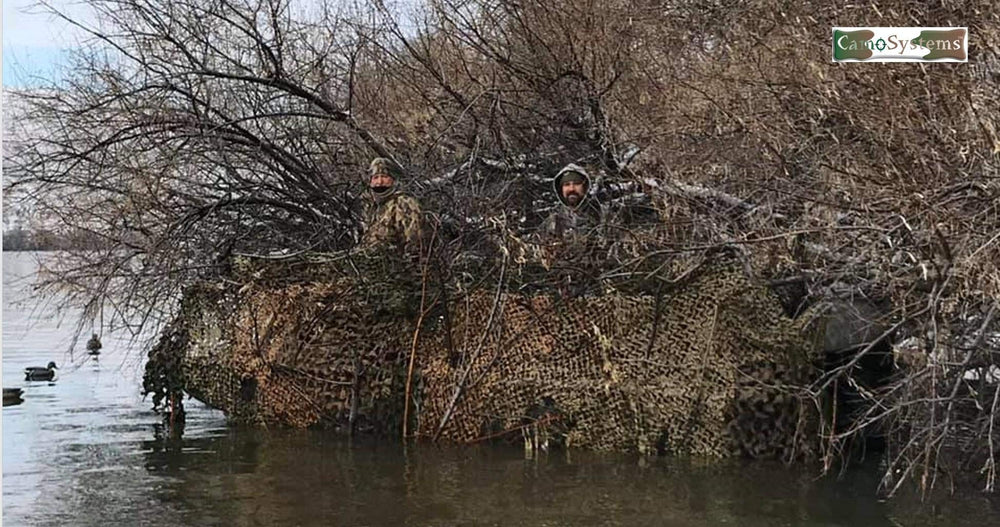 CamoSystems waterproof camouflage netting demonstrates all-weather protection against rain and sun.
