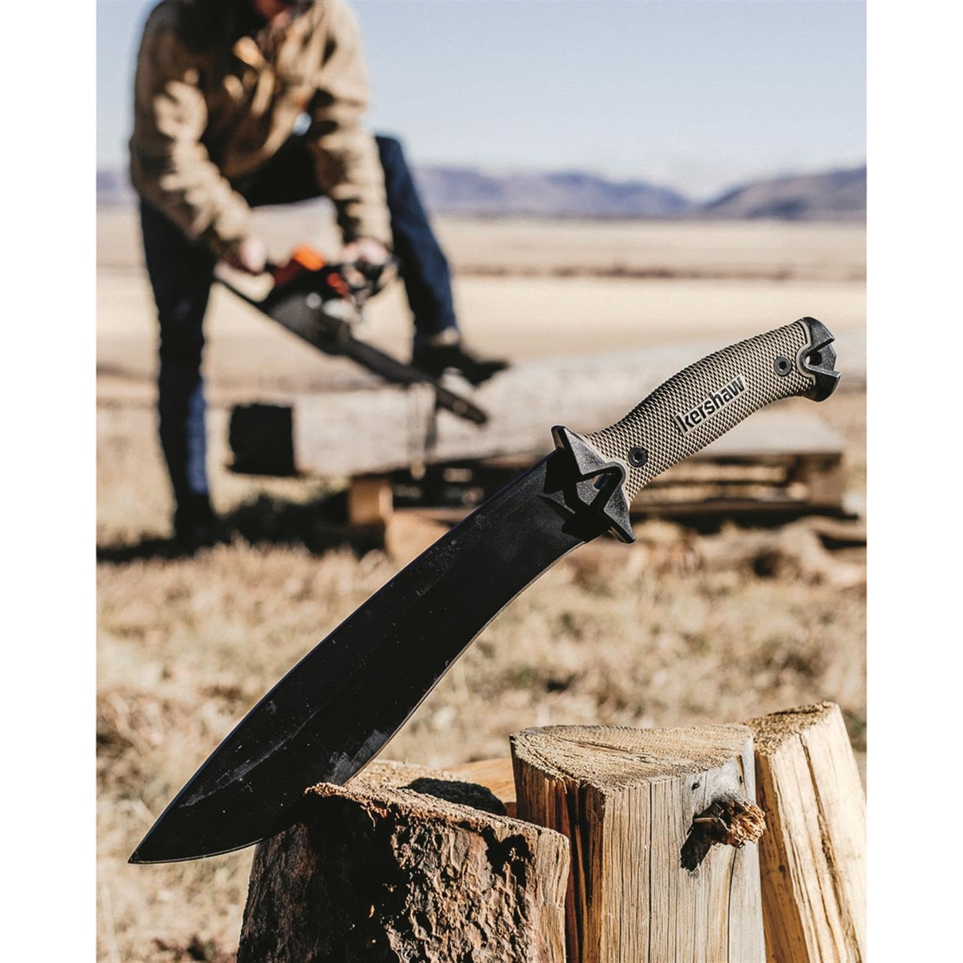 Camp 10 Tan machete shown in outdoor setting with sheath