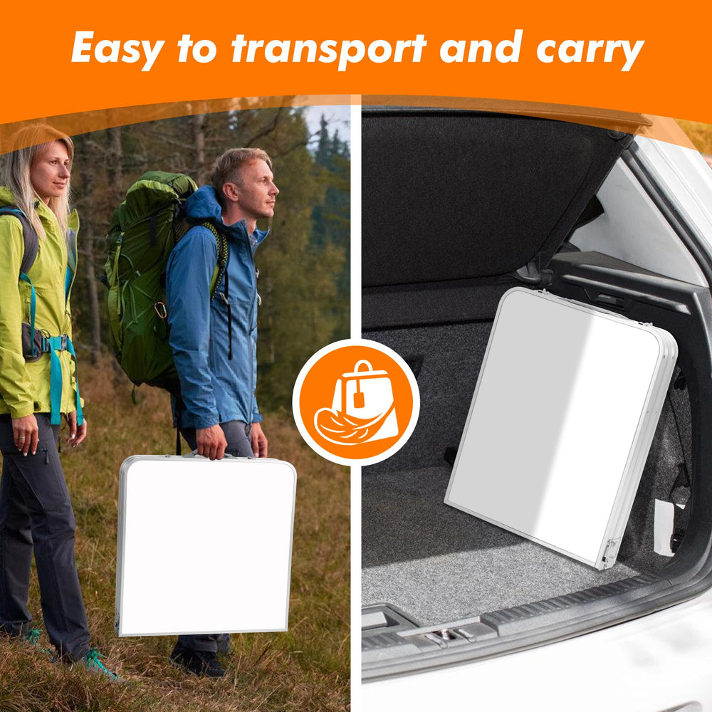 Camp Field folding table beside grill and lantern for outdoor cooking.