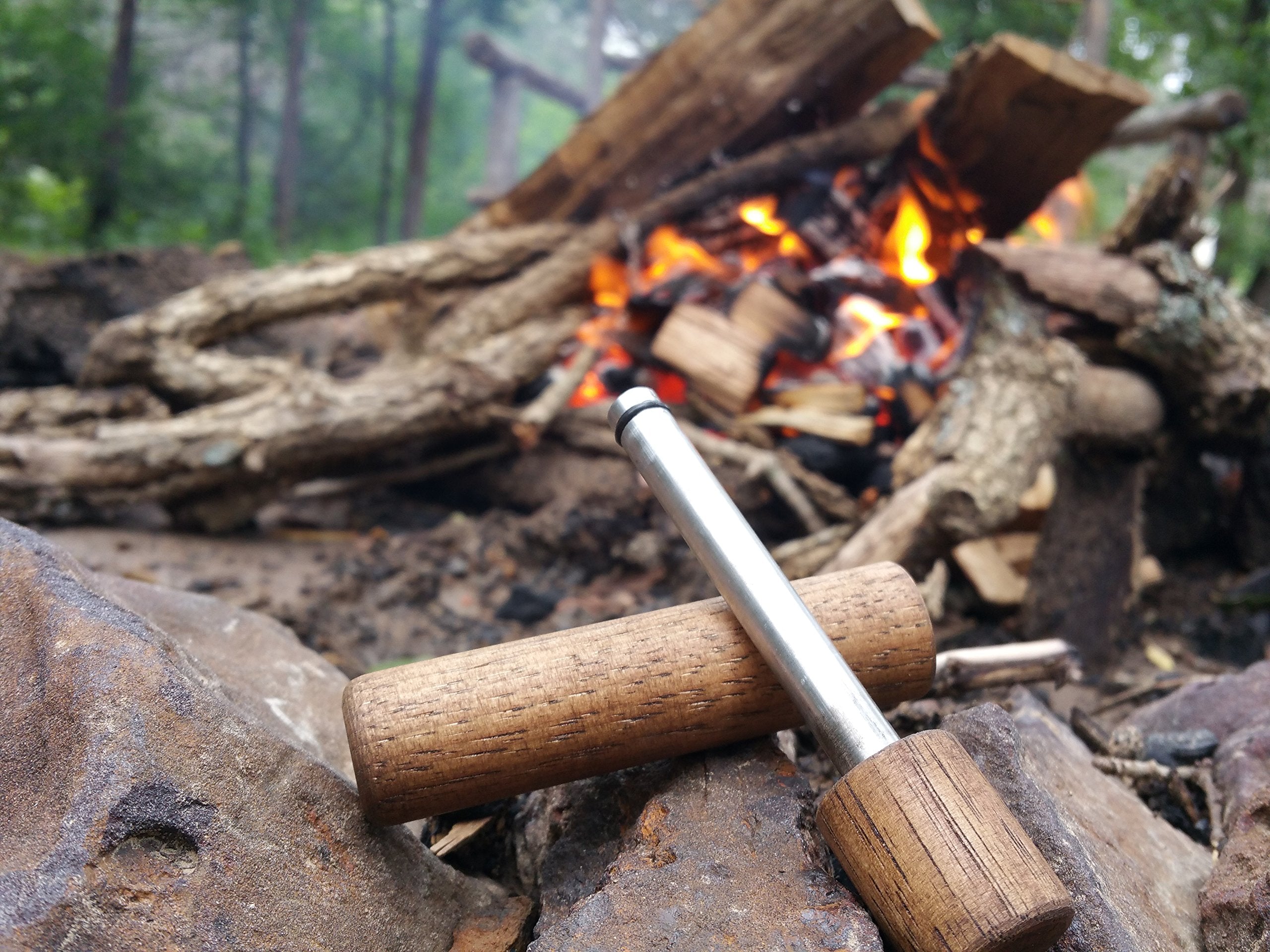 CampfirePiston Hickory Fire Piston ergonomic handle detail emphasizes effortless operation.