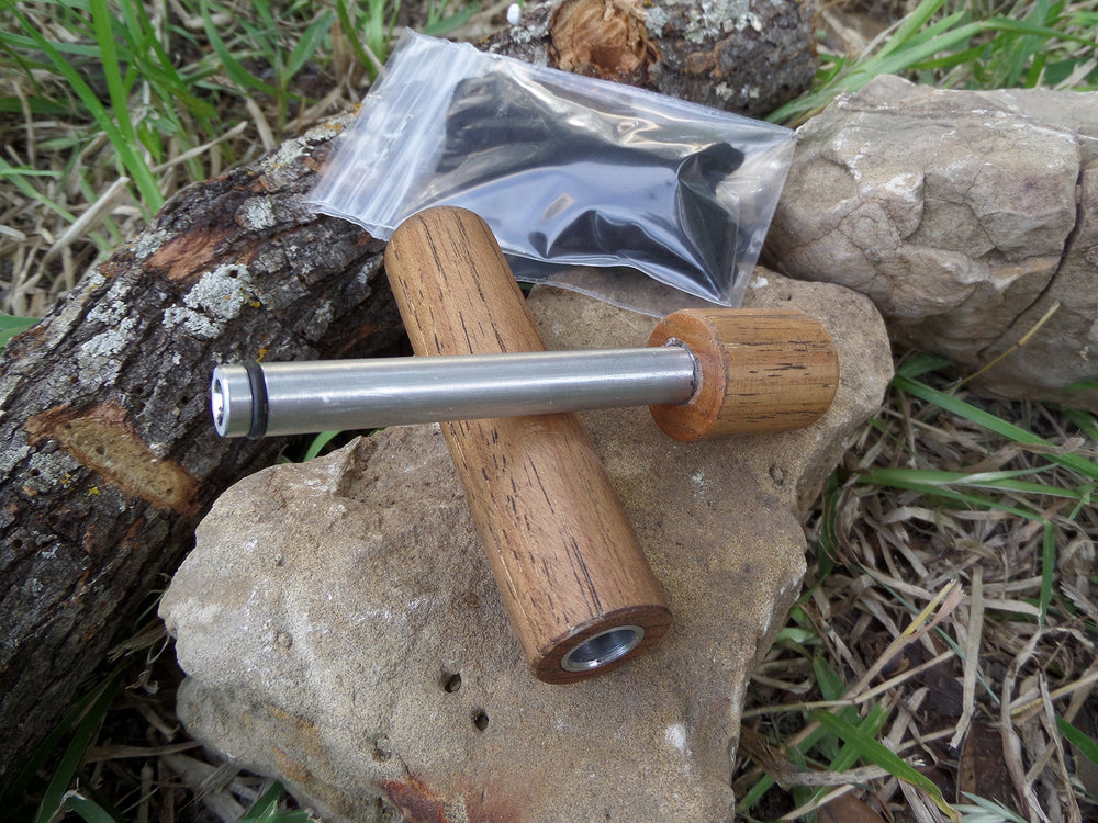 CampfirePiston Hickory Fire Piston wood encasement highlights durable, time-tested construction.