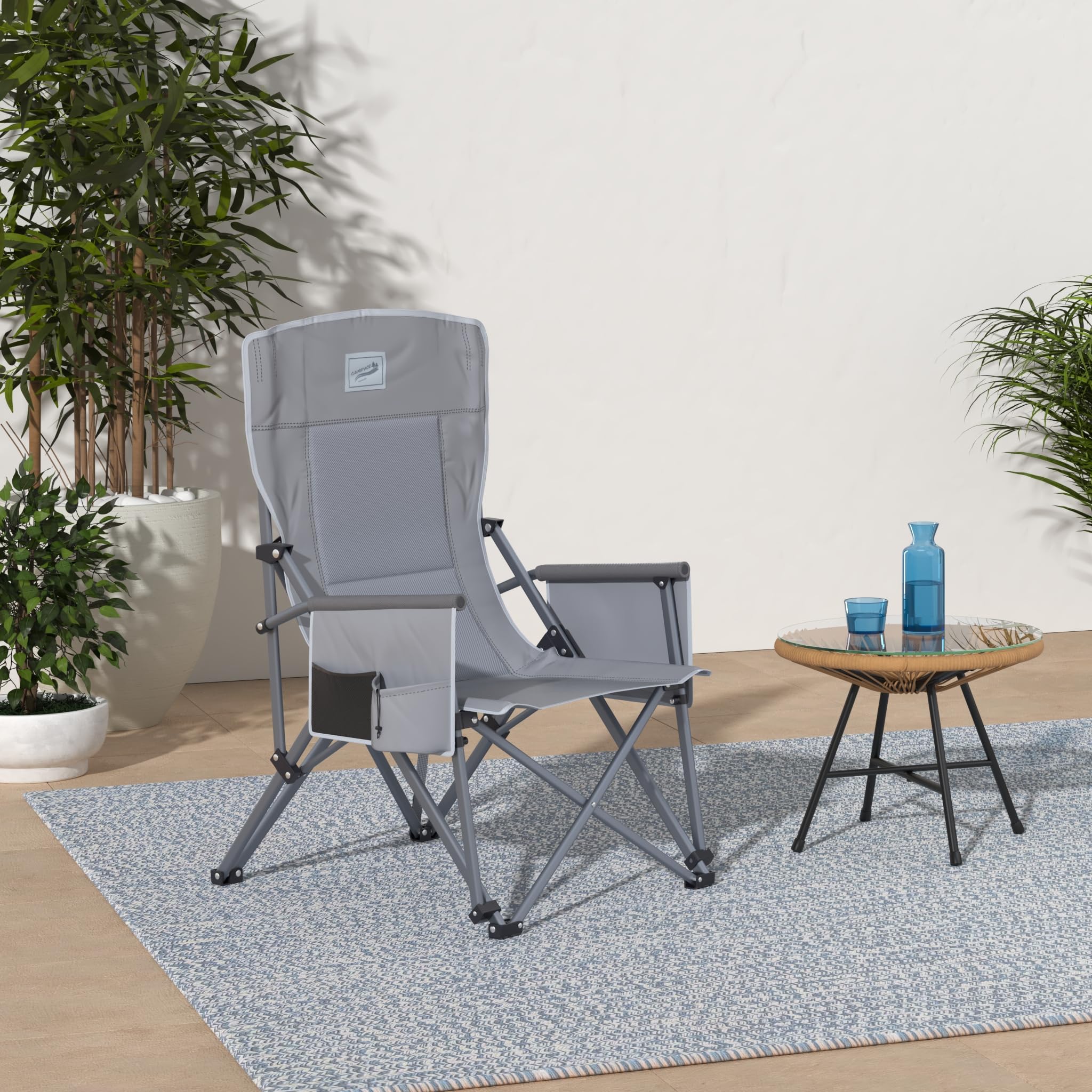Camphor Designs heavy-duty chair at the beach, ready for lounging and sun.