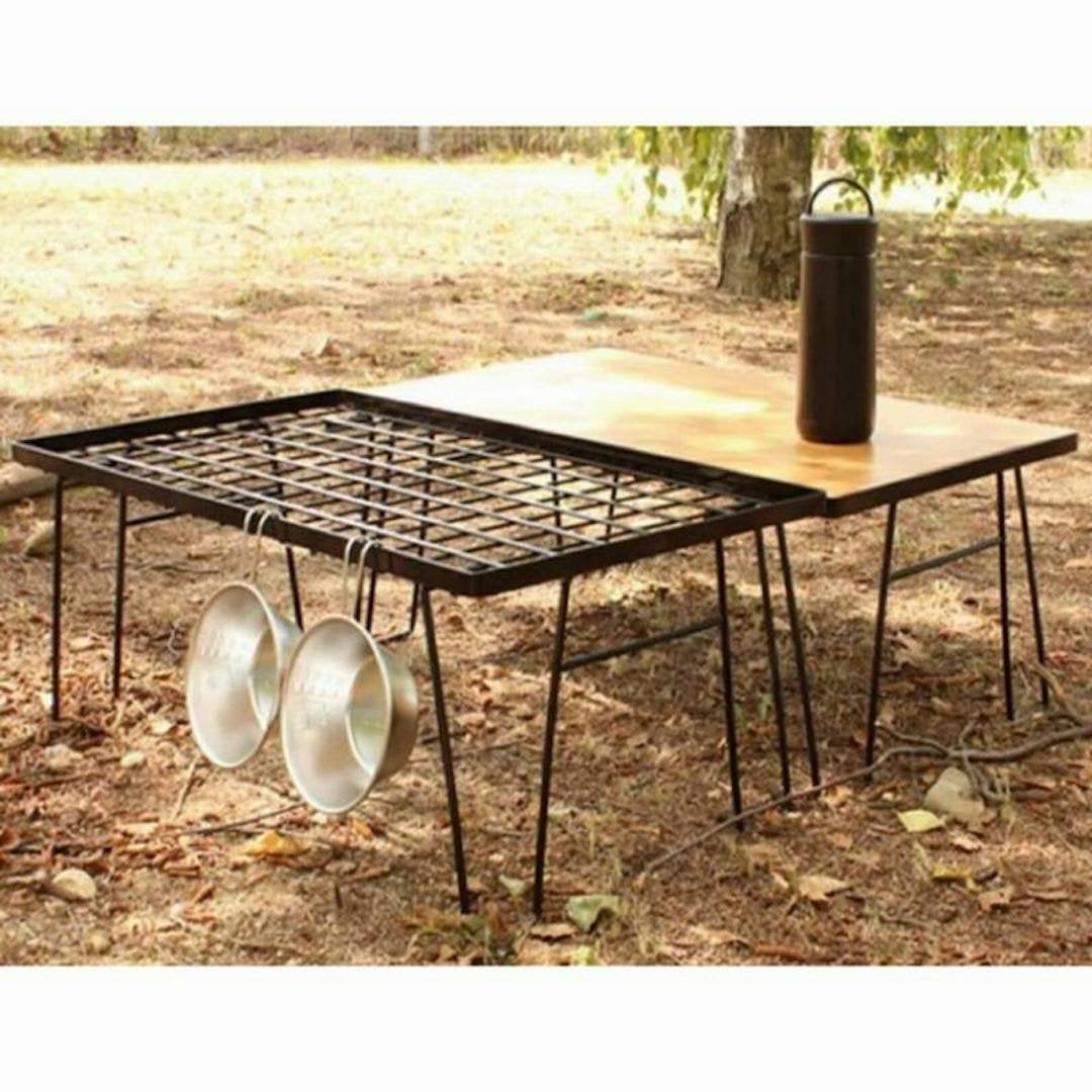 Camping Moon BBQ Grill multipurpose station used as a table for meals.