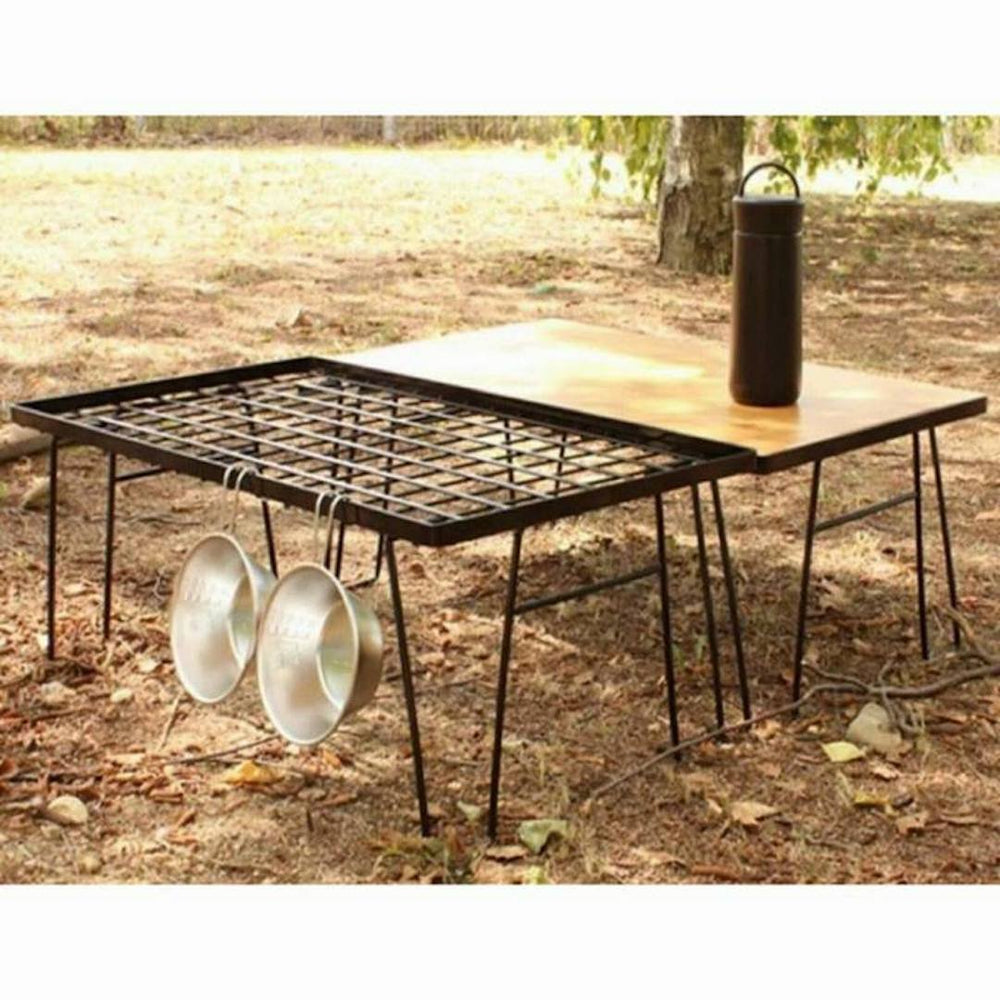 Camping Moon BBQ Grill multipurpose station used as a table for meals.