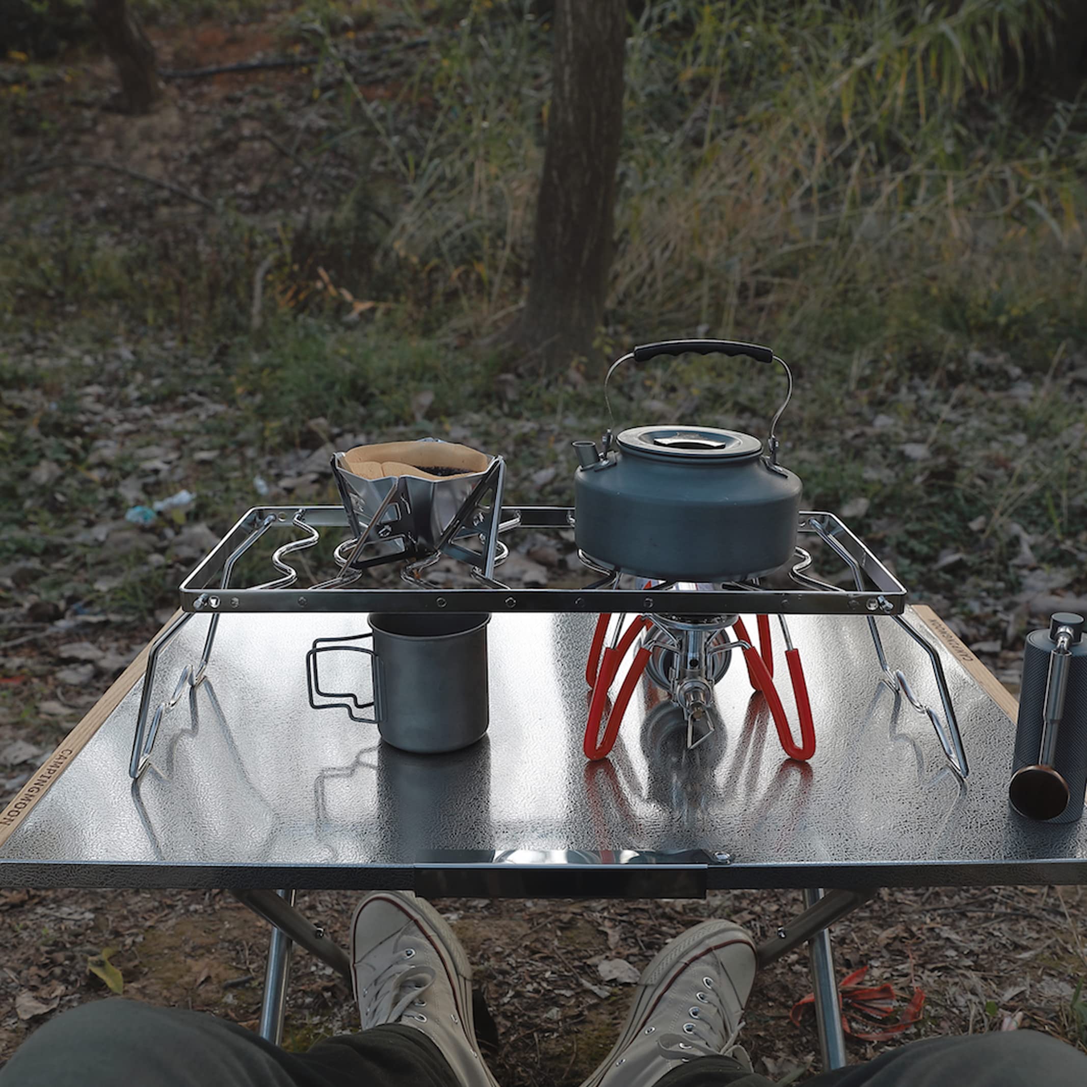 Camping Moon beach picnic usage image shows versatile over-fire cooking scenarios