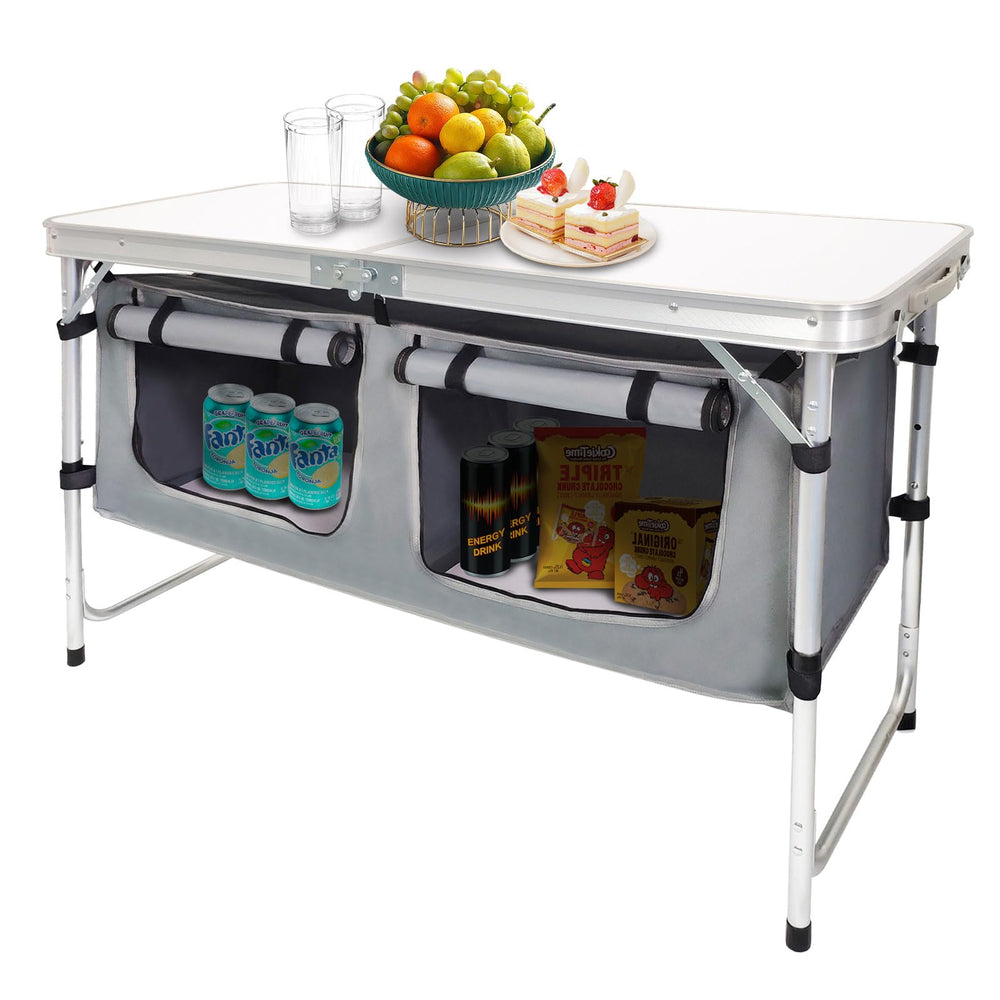 CampLand folding camping table with aluminum legs provides a sturdy outdoor work surface.