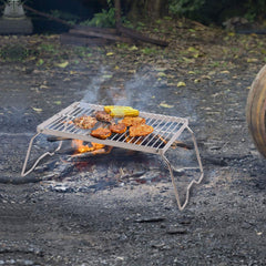 CAMPMAX Campfire Grill folded legs save space for transport.