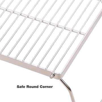CAMPMAX Campfire Grill stable on uneven ground for outdoor cooking.