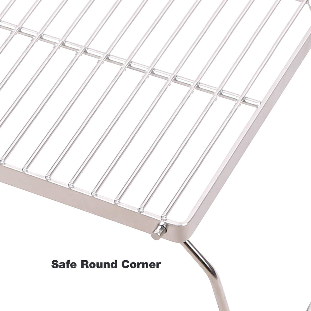 CAMPMAX Campfire Grill stable on uneven ground for outdoor cooking.