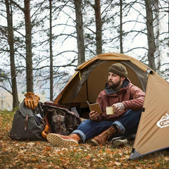 Camppal 1 Person Tent exterior shows rainproof protection during heavy rainfall.