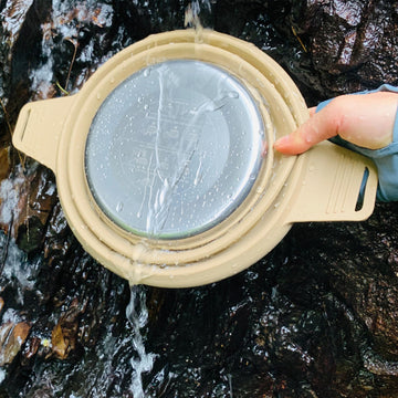 CAMPWOLF 8.8-inch diameter pot base demonstrates stable cooking surface outdoors.
