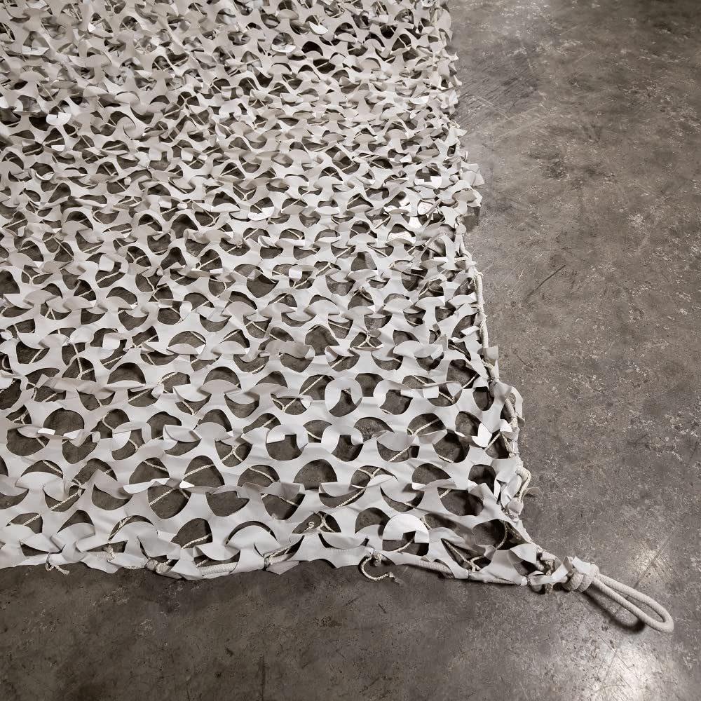 CamoSystems large camouflage net in backyard setup for privacy and shade