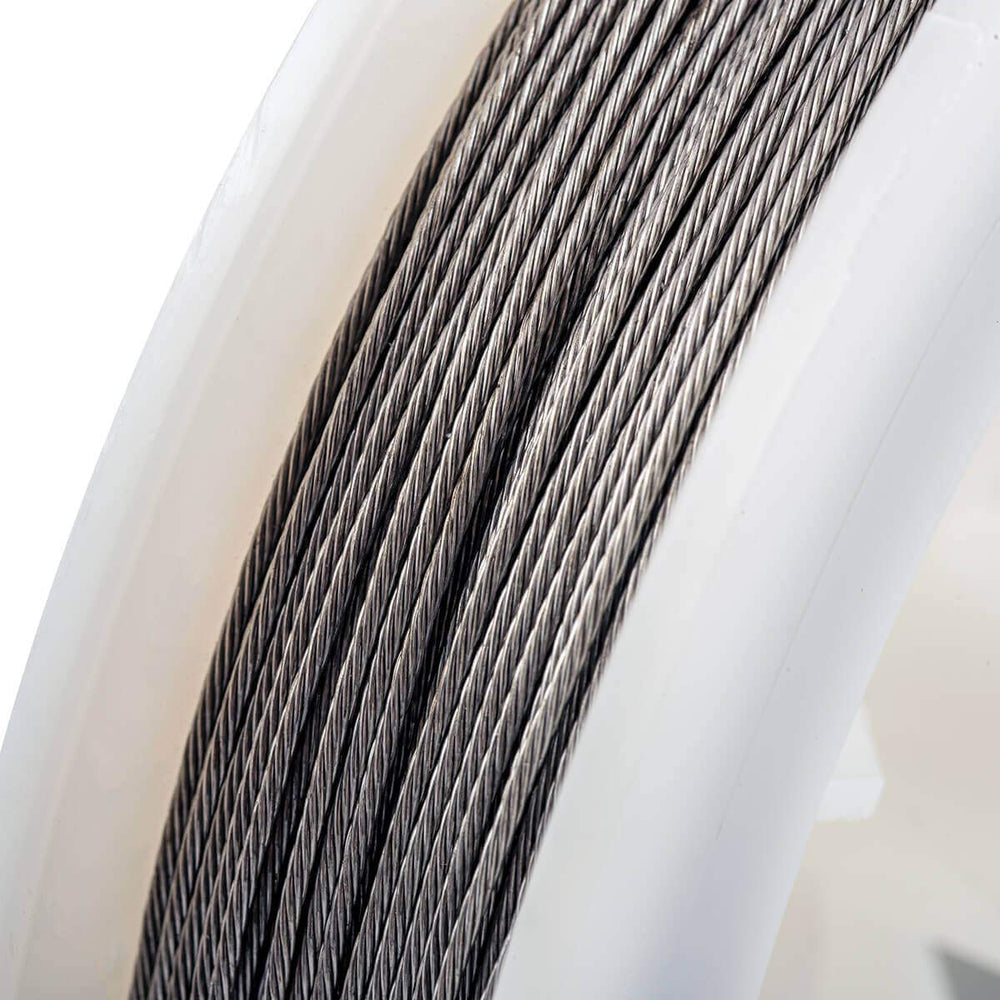 Close-up of Cannon 7-strand braided downrigger cable showing flexible braid to resist kinking.