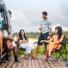 Canpsky green folding chair setup ready on uneven ground for outdoor use