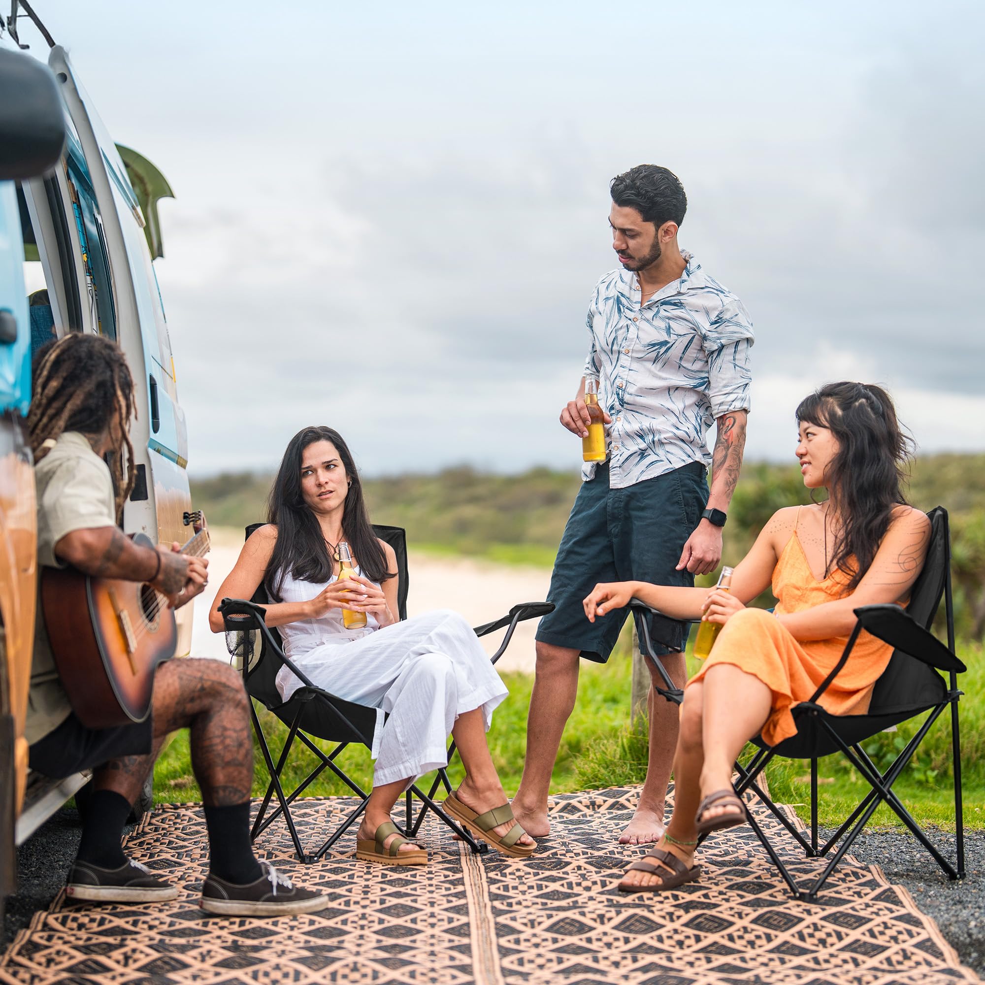Canpsky two-pack folding chair in outdoor picnic use demonstrating versatility.