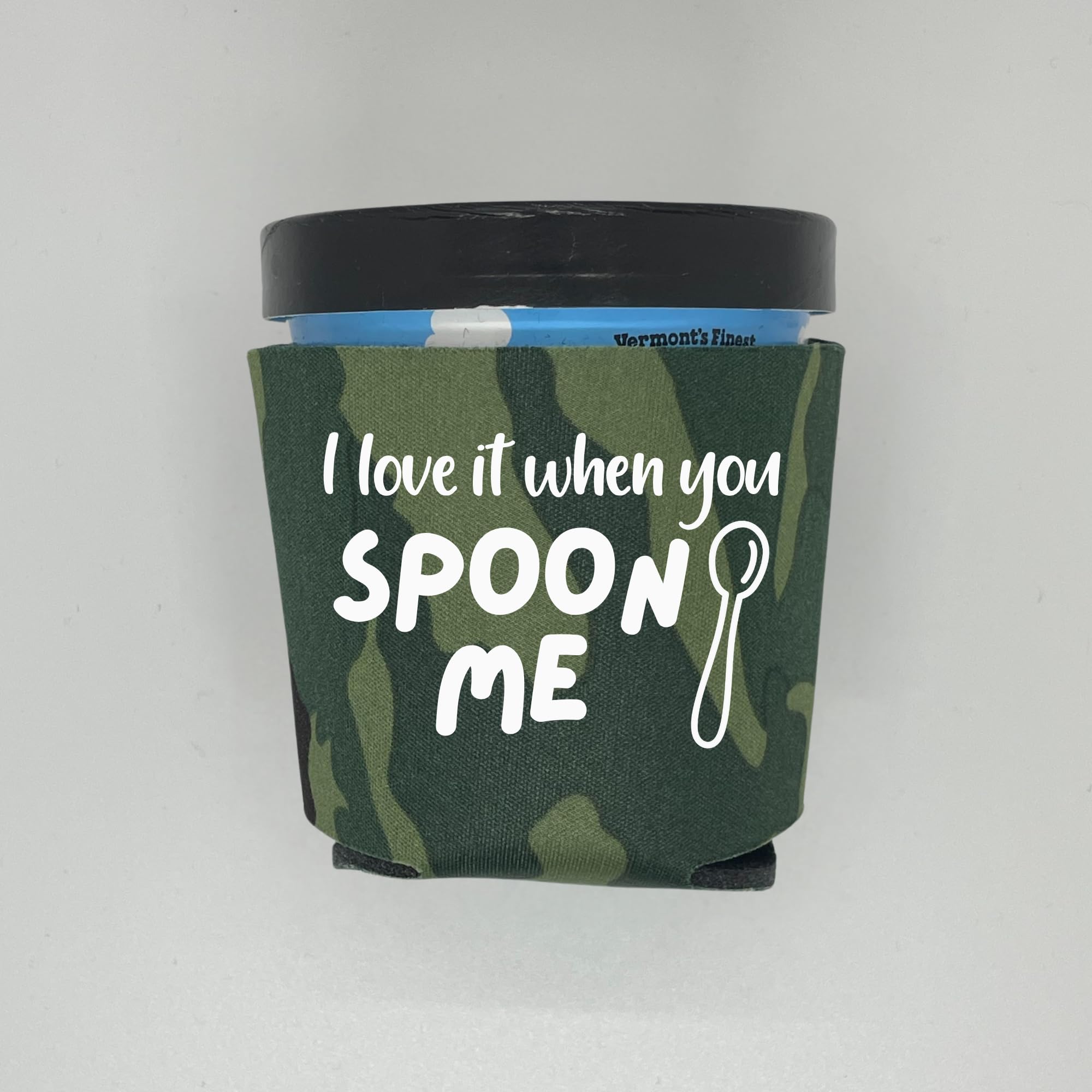 Capital City Commerce green camouflage foam holder shown collapsed for easy storage.