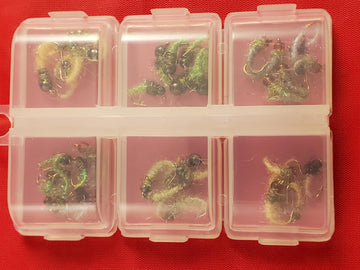 Capt. Ken's Ice Caddis color selection including green and peacock