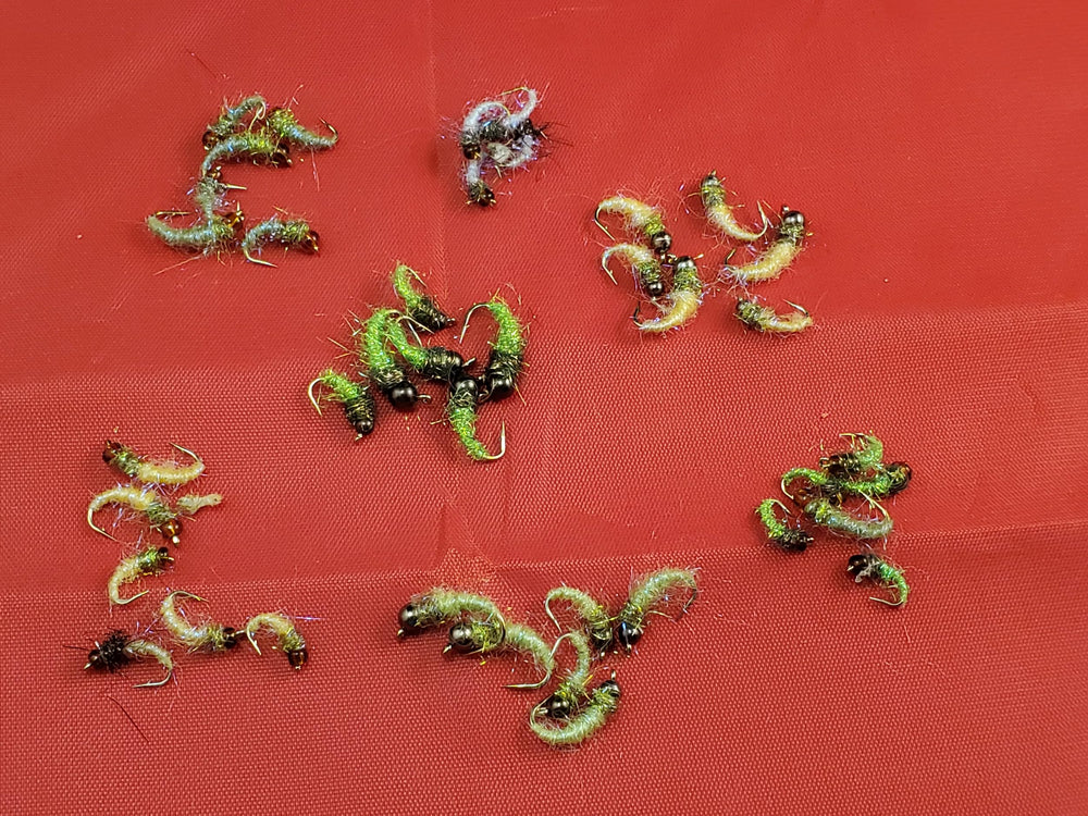 Capt. Ken's Ice Caddis 40 Fly Selection in a lanyard box for quick access