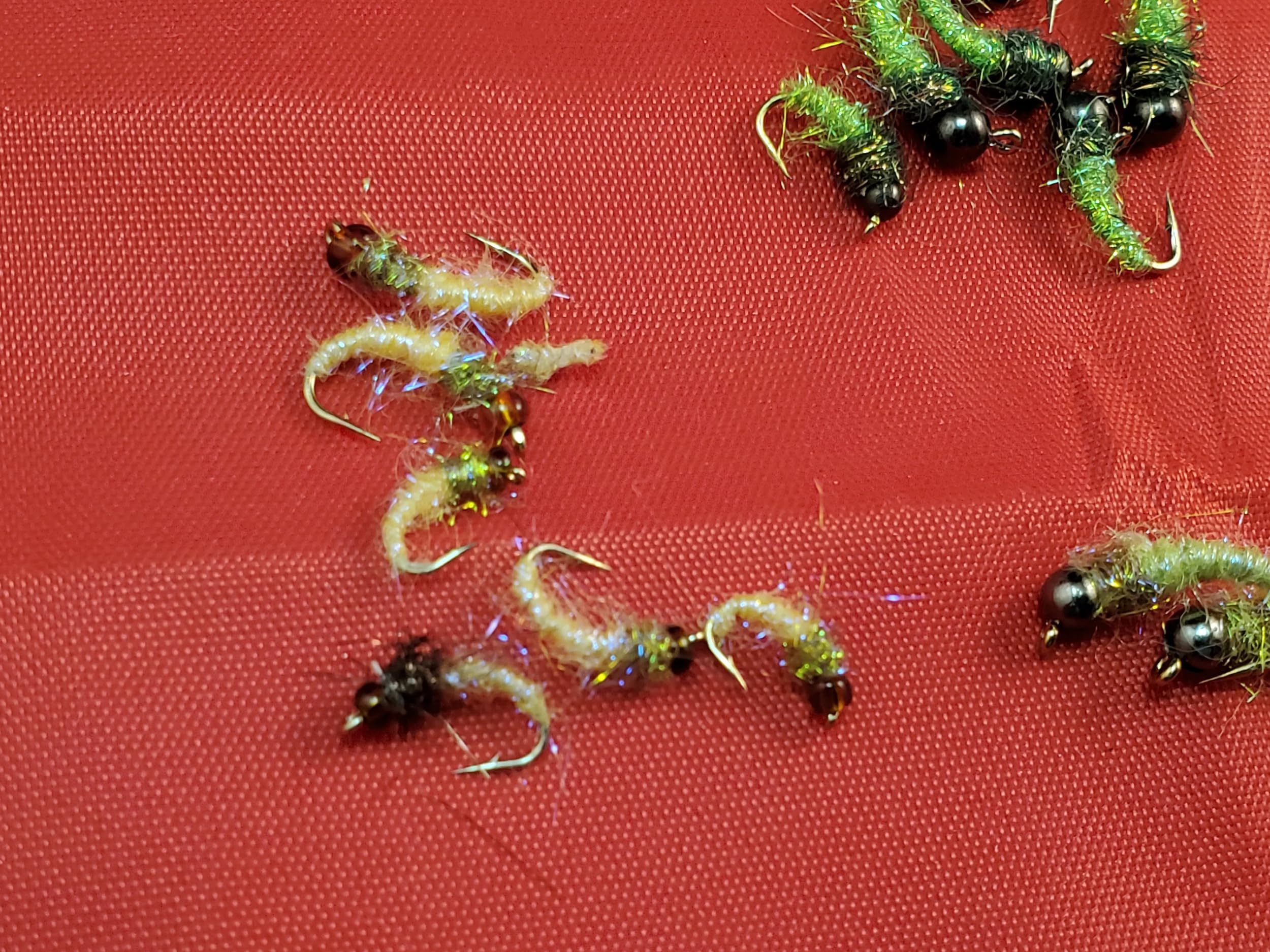 Capt. Ken's Ice Caddis Pupa close-up showing dubbing texture
