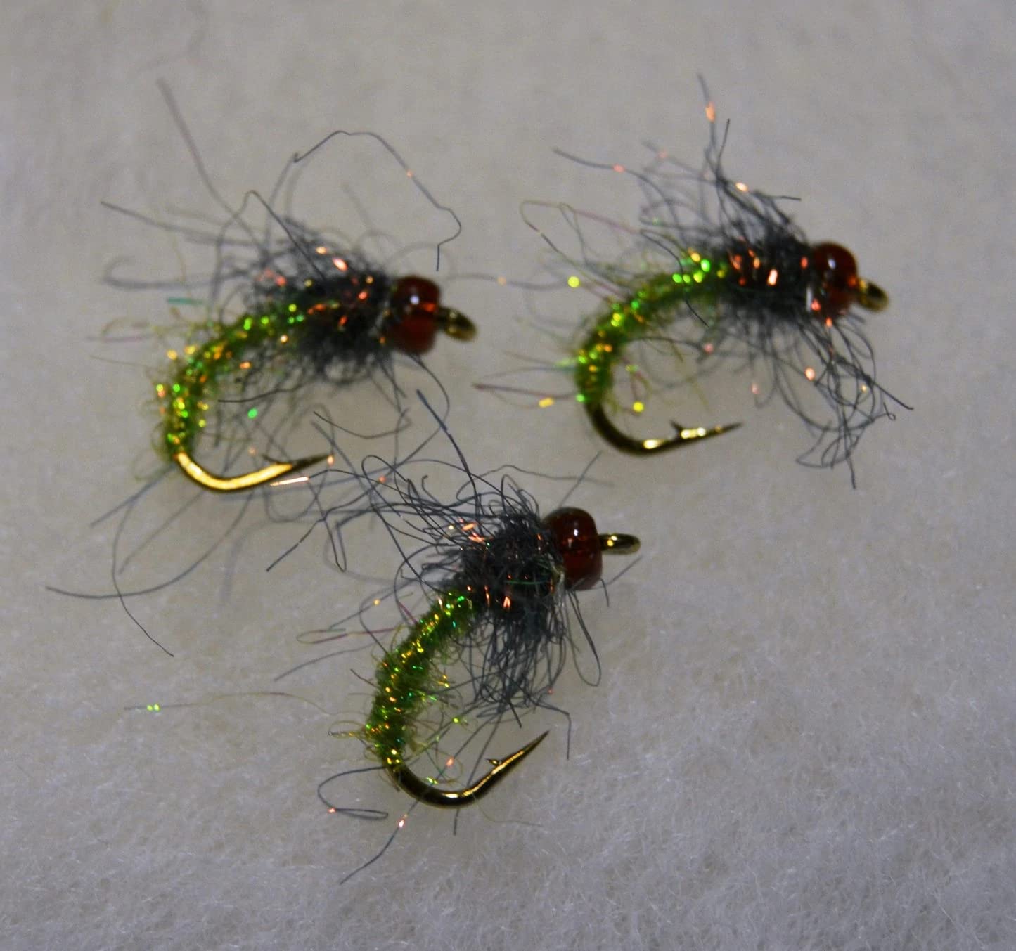 Capt. Ken's Tungsten bead heads in three colors and sizes