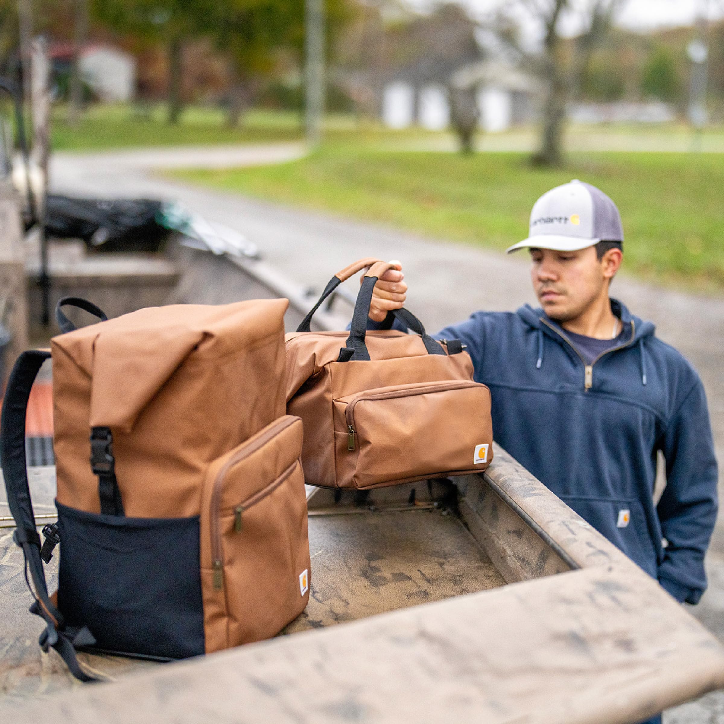 Carhartt Bluestone cooler built-in bottle opener for convenience.