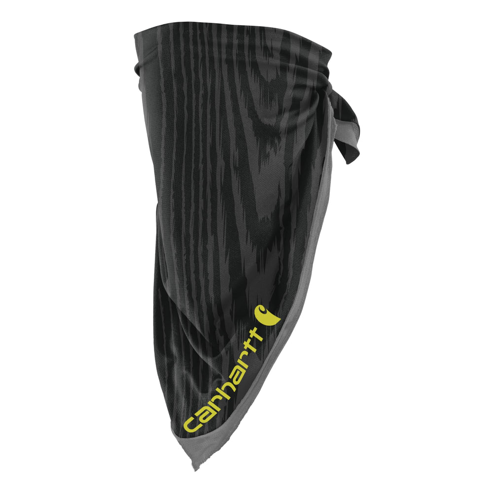Carhartt Force bandana woodgrain print worn on face for sun protection.