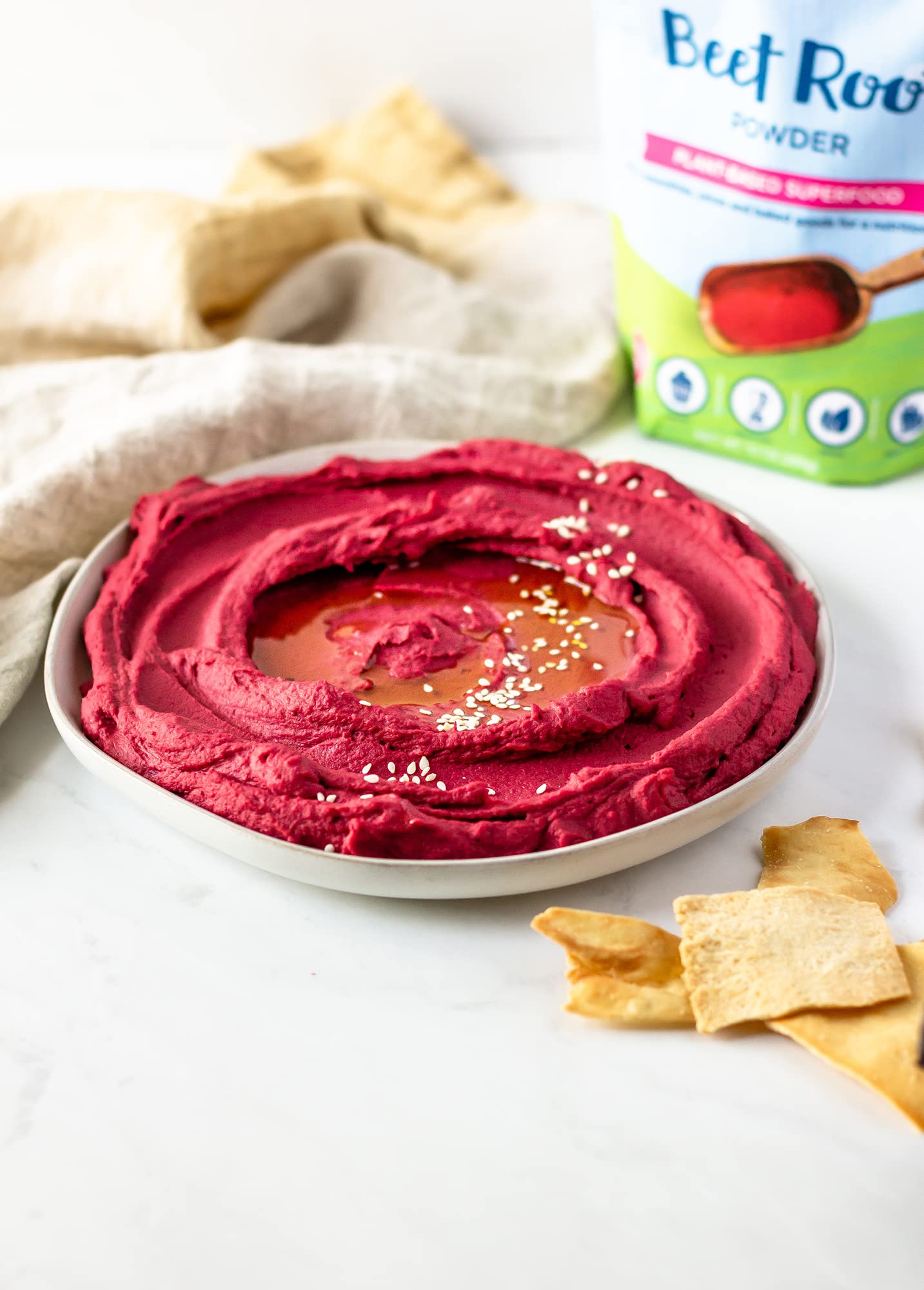Carrington Farms Beet Root Powder measuring scoop in bowl for desserts.