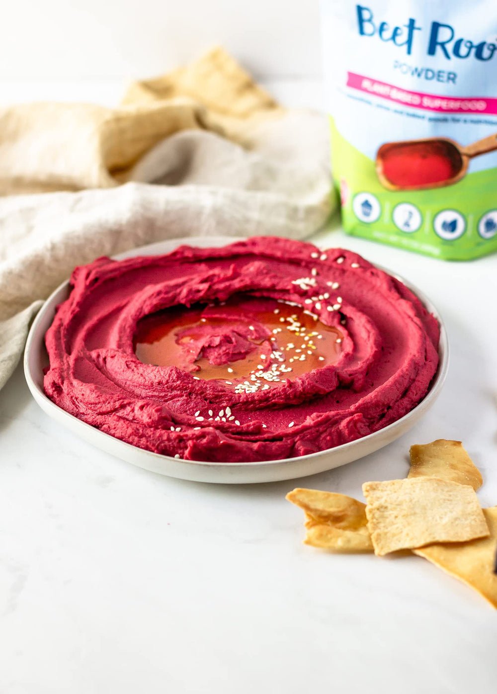 Carrington Farms Beet Root Powder measuring scoop in bowl for desserts.