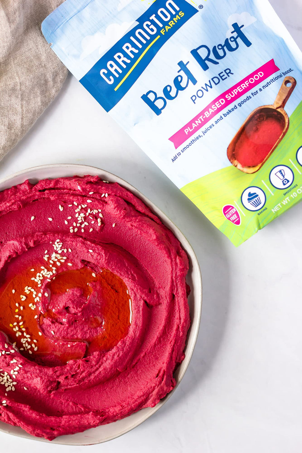 Carrington Farms Beet Root Powder pour into glass for vibrant beverages.