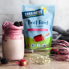 Carrington Farms Beet Root Powder scoop on counter for baking and shakes.