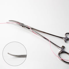 CASTSTRIKE pin-on reel attached to vest