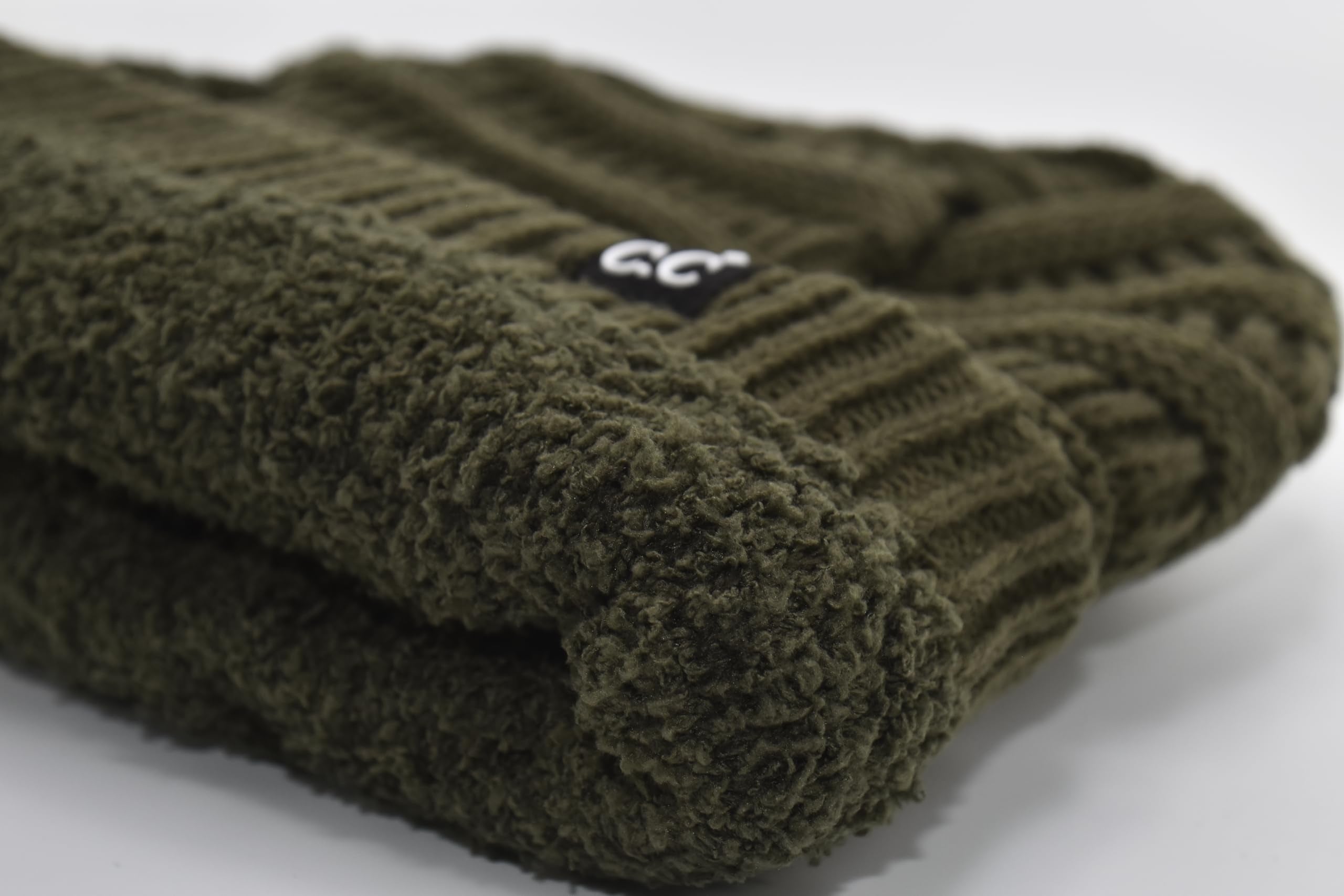 C.C beanie on coat hanger, online listing image