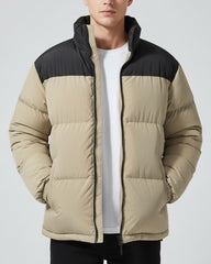 Ceauros men's winter coat with waterproof finish protects against light rain during adventures