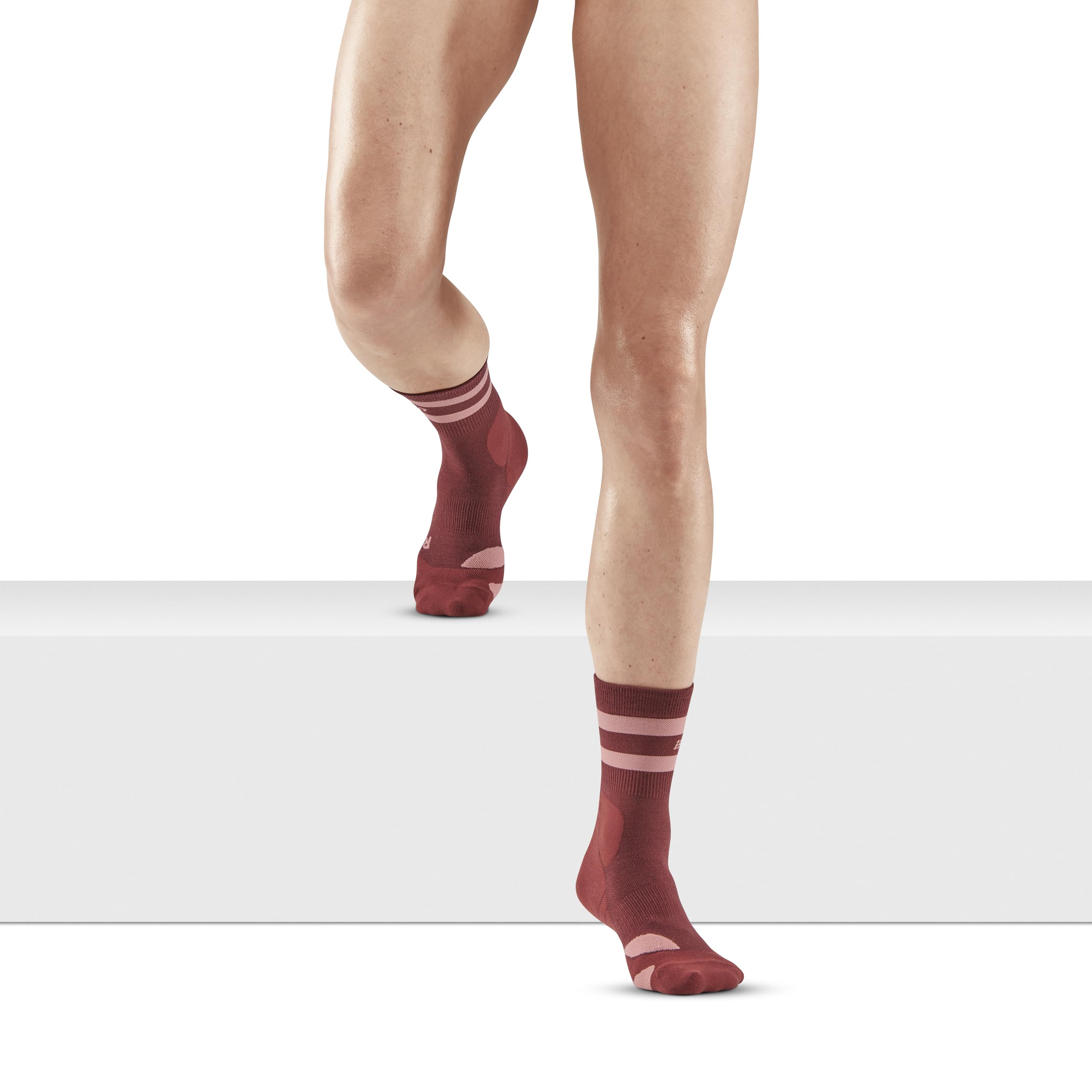 CEP 80's Hiking Mid Cut Sock highlighting arch-support feature for steady climbs.