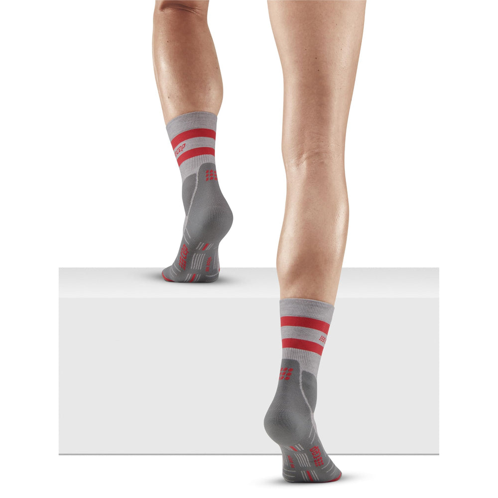 CEP 80's hiking mid-cut socks highlight ankle compression for added stability during climbs.