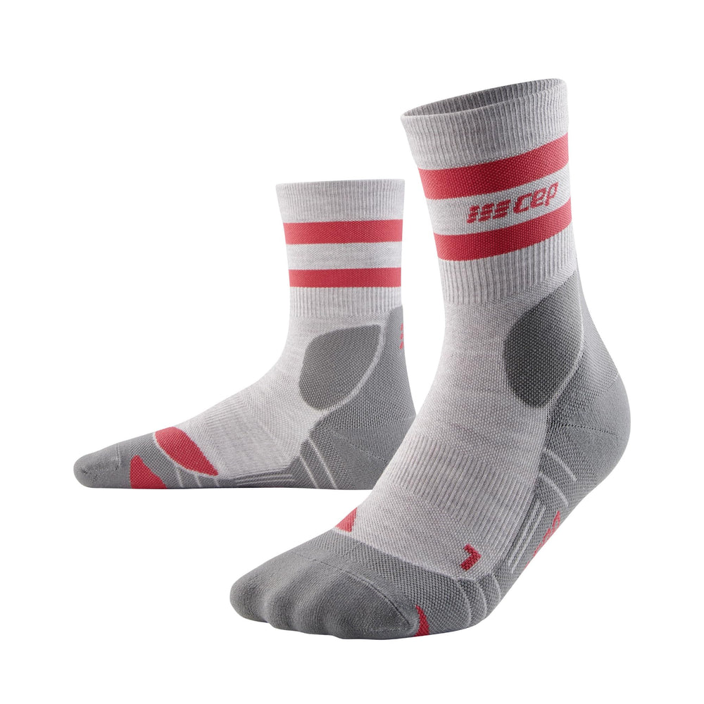 CEP 80's hiking mid-cut socks show arch support to reduce midfoot fatigue.