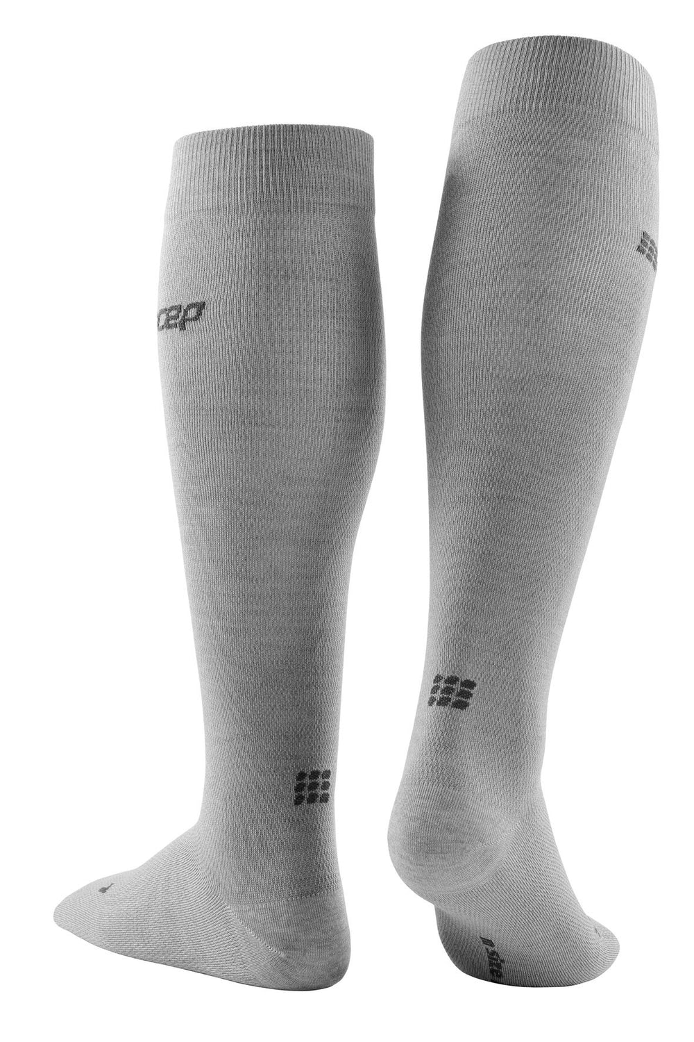 CEP Allday Merino Tall Socks worn during a run for comfort and support