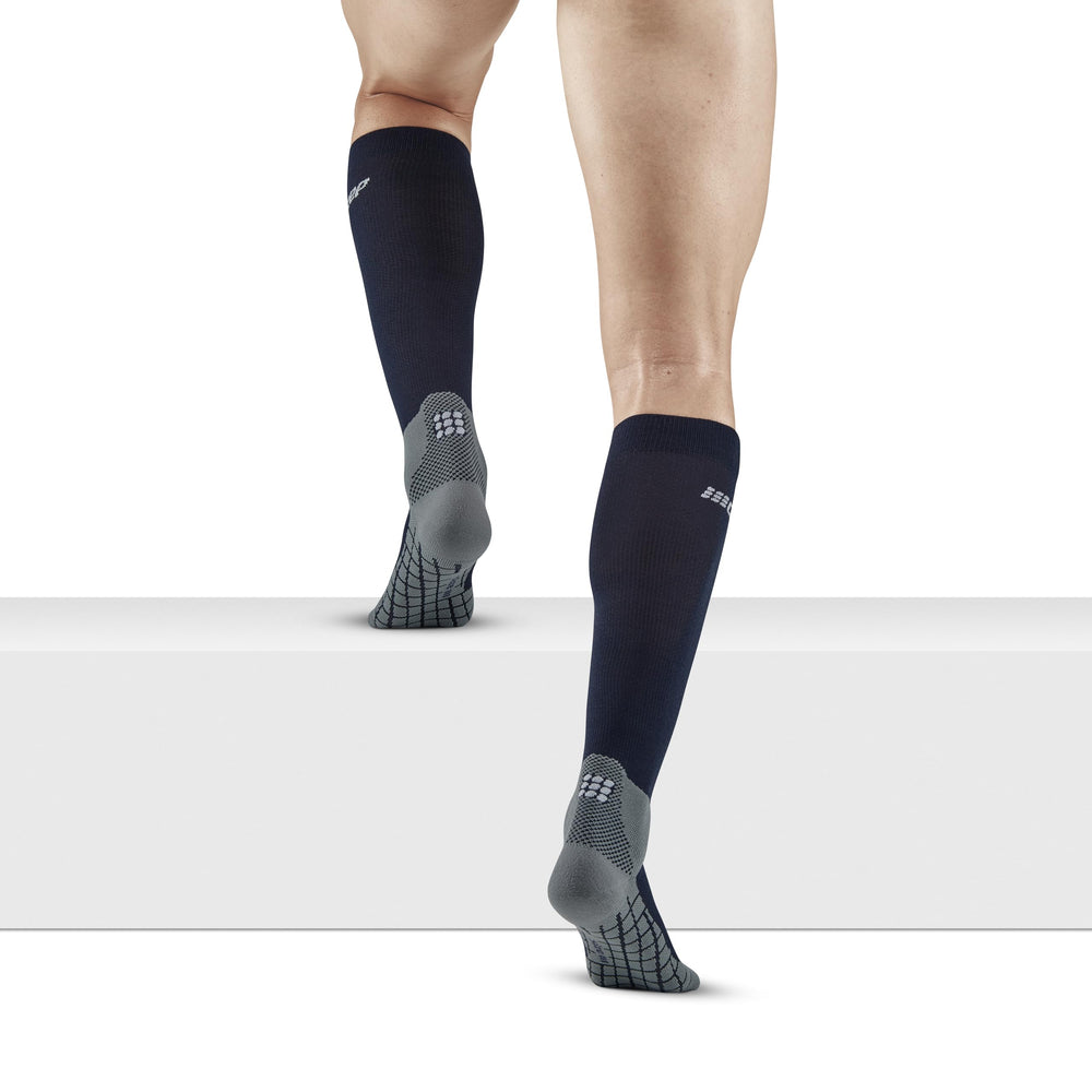 Calf-knit structure enhancing ventilation during warmer trail days