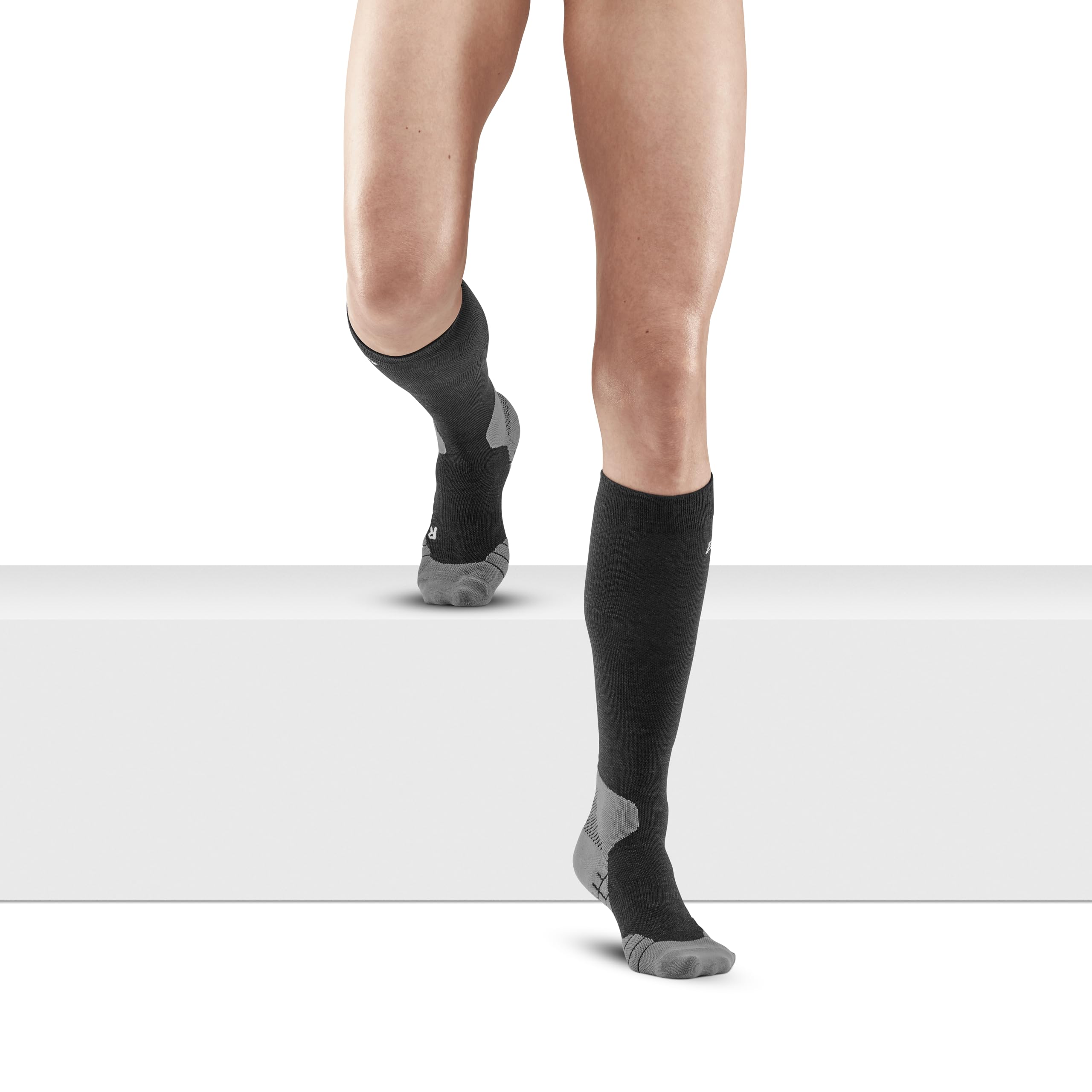 CEP Hiking Light Merino Tall Socks highlight odor-control merino wool and breathable calf knit.