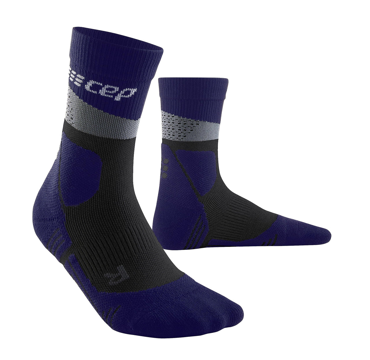 CEP Max Cushion hiking mid-cut socks in grey and black worn on trail-ready foot for all-day comfort.