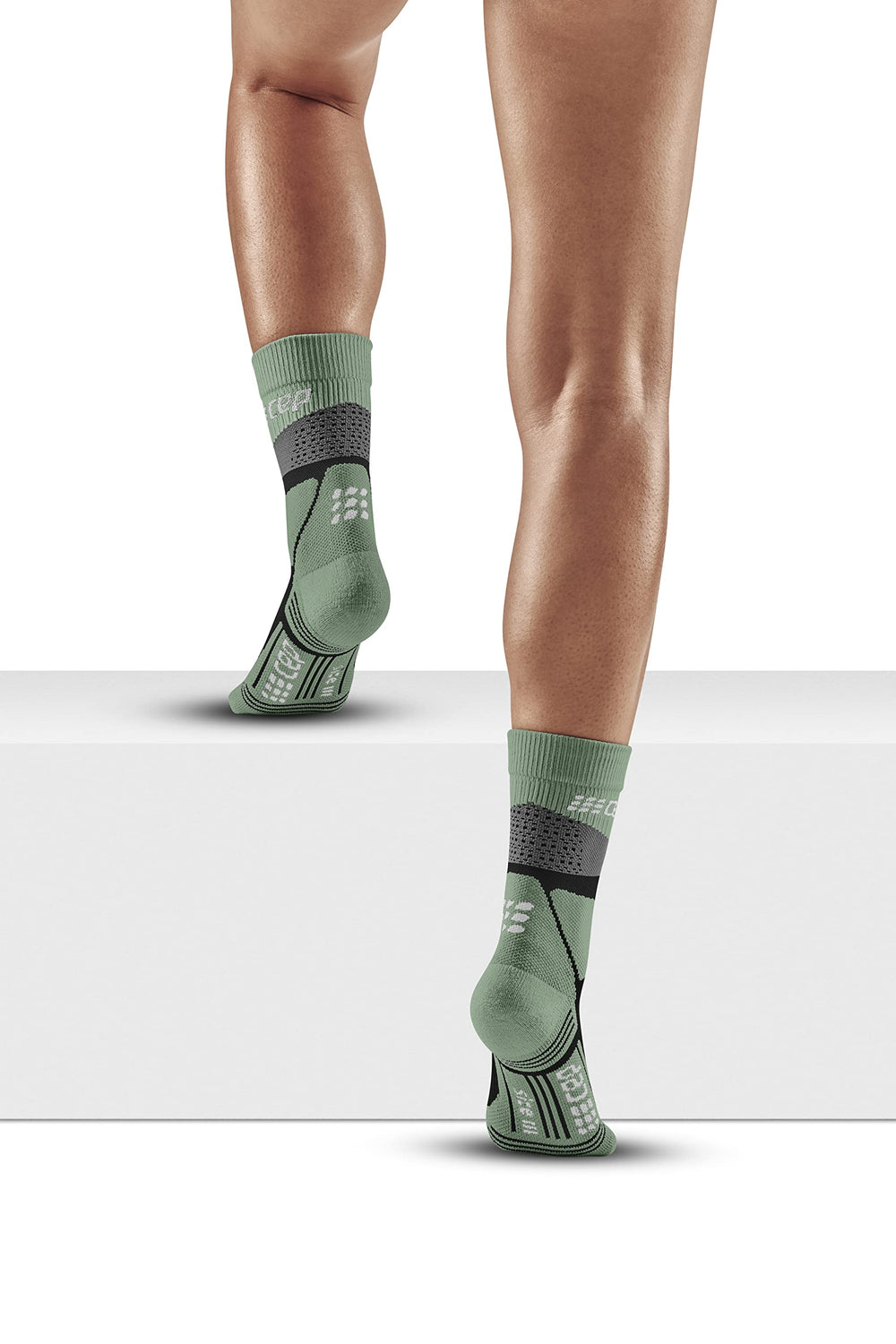 CEP Max Cushion hiking socks grey mint, in-boot-wear shot suggests reliable ankle protection.