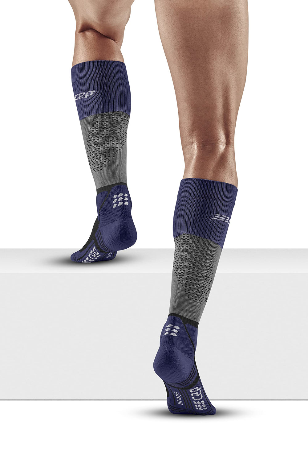 CEP Max Cushion hiking tall sock pack shot showing two color options and design.