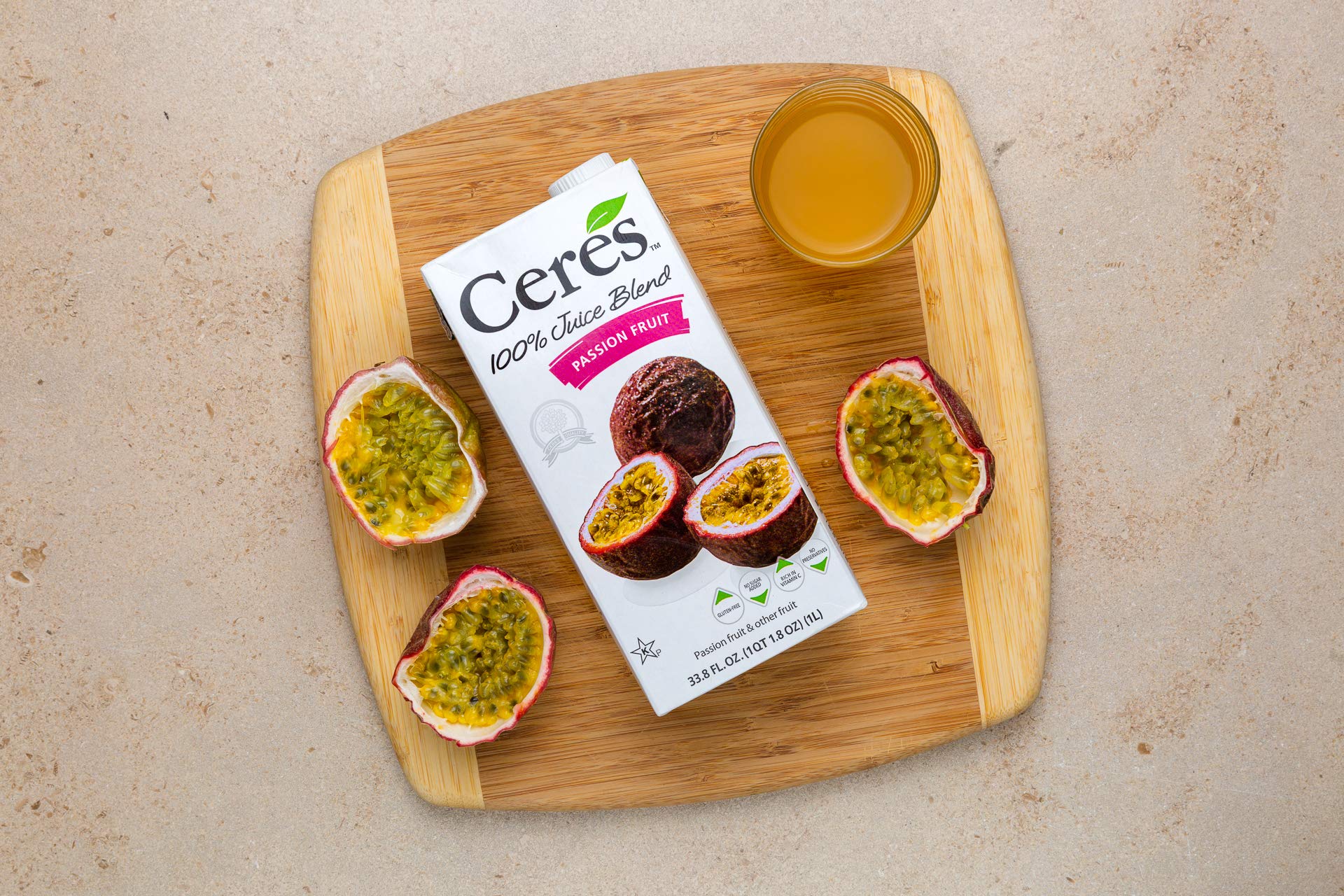 Ceres Passion Fruit Juice packaging highlights 33.8 oz bottle size for family sharing.