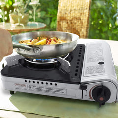 Chef Master wind guard in use stabilizing flame outdoors