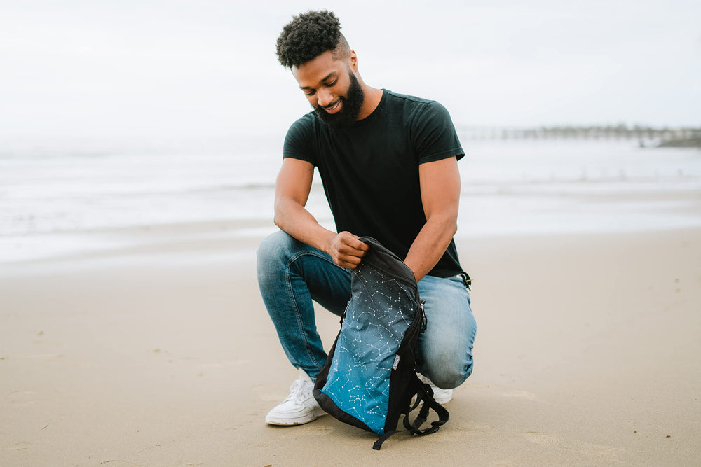 ChicoBag Travel Pack rePETe lightweight backpack being worn