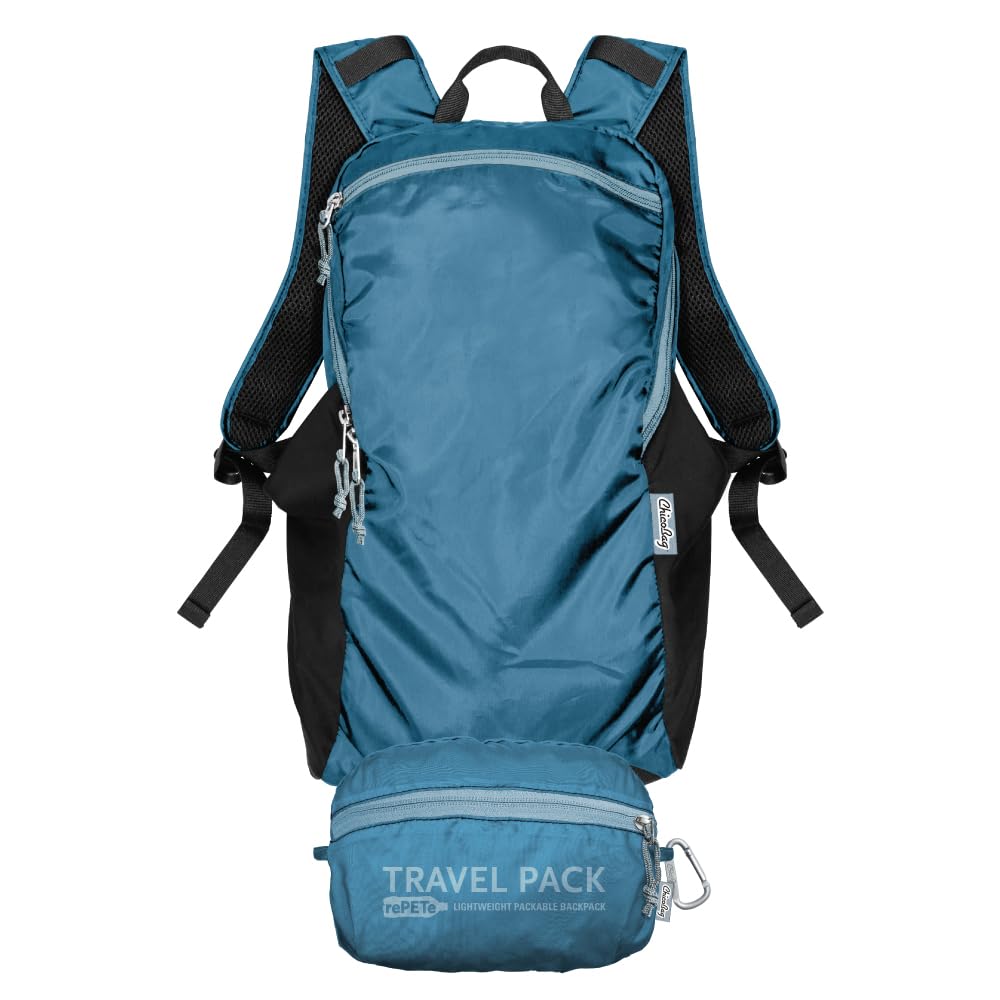 ChicoBag Travel Pack rePETe + Refine Sapphire folded in its built-in pouch for compact travel.