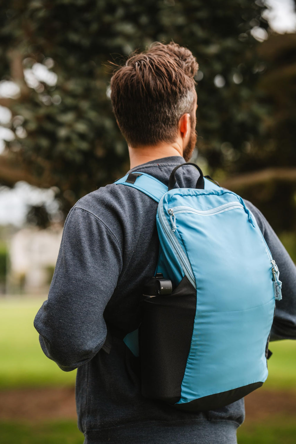 ChicoBag Travel Pack rePETe + Refine Sapphire machine washable for easy cleaning after trips.