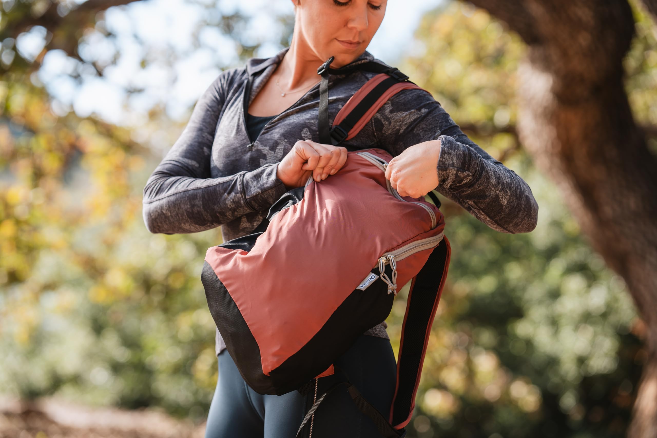 ChicoBag Travel Pack rePETe + Refine Sapphire large main compartment open for essentials.