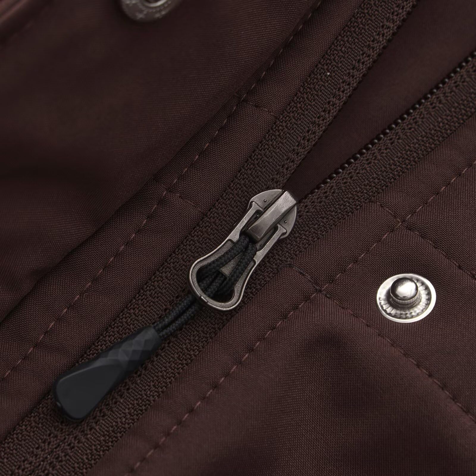 CHIGUO jacket chest and side pockets for practical storage during outdoor activities.