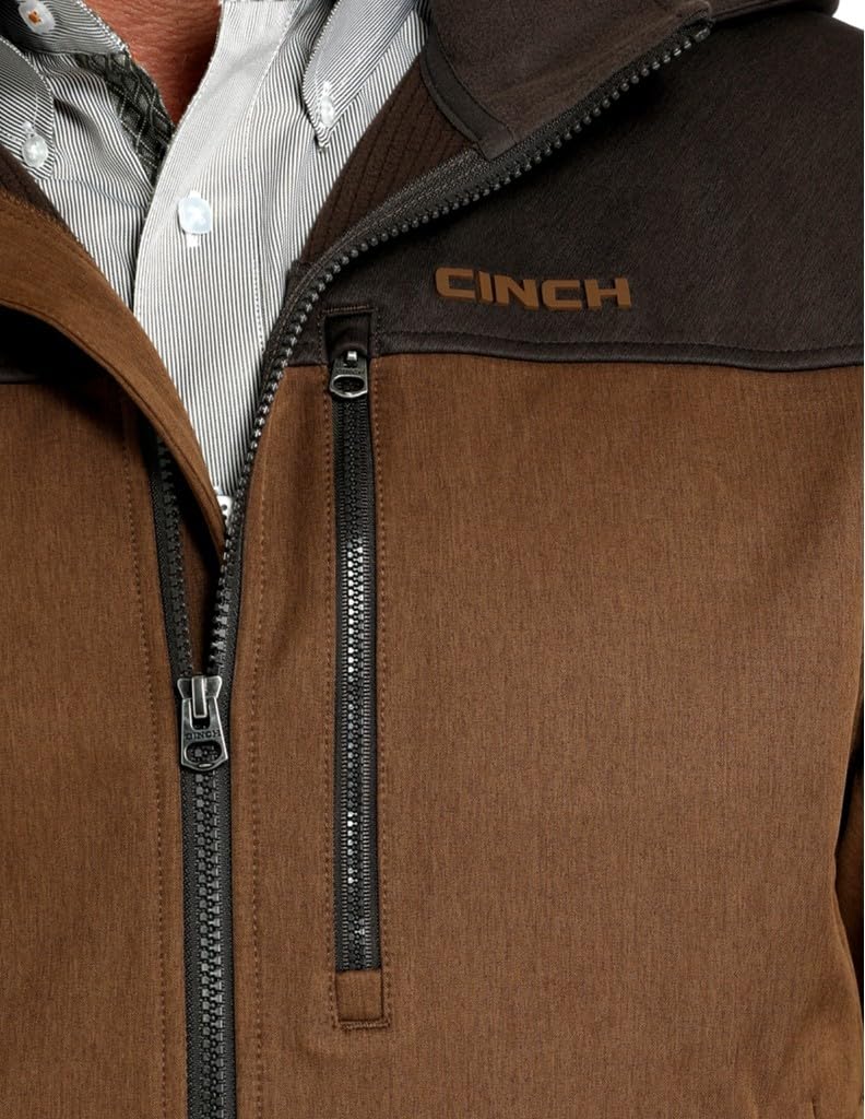 Cinch men's brown hooded softshell jacket, pockets close-up, showing secure zip pockets for outdoor storage.